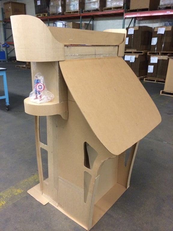 The project started with whiteboard sketches. Then we created a cardboard model. This allowed our customer to walk around it to get an actual feel for size and shape.
