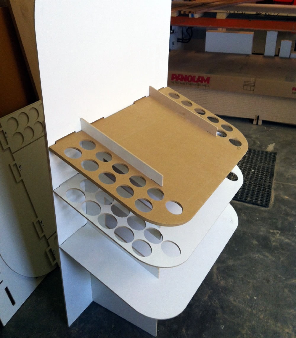 We prototyped in cardboard, melamine, and plastic.