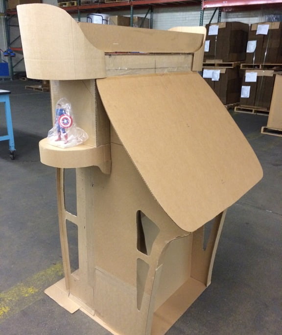 The project started with whiteboard sketches. Then we created a cardboard model. This allowed our customer to walk around it to get an actual feel for size and shape.